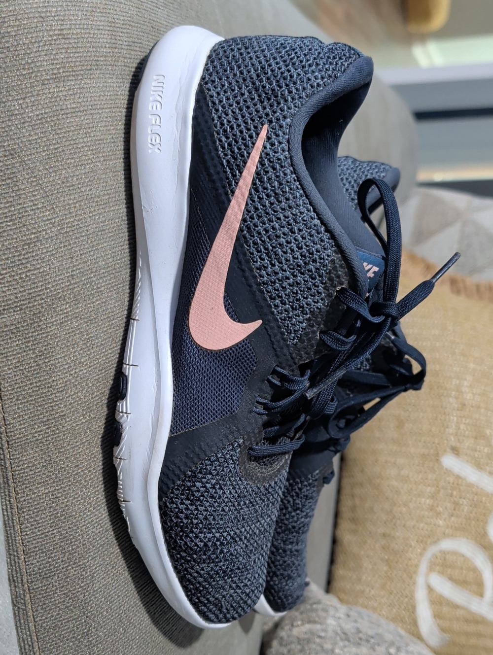 Nike Women’s Dark Blue Running Shoes with Pink Swoosh